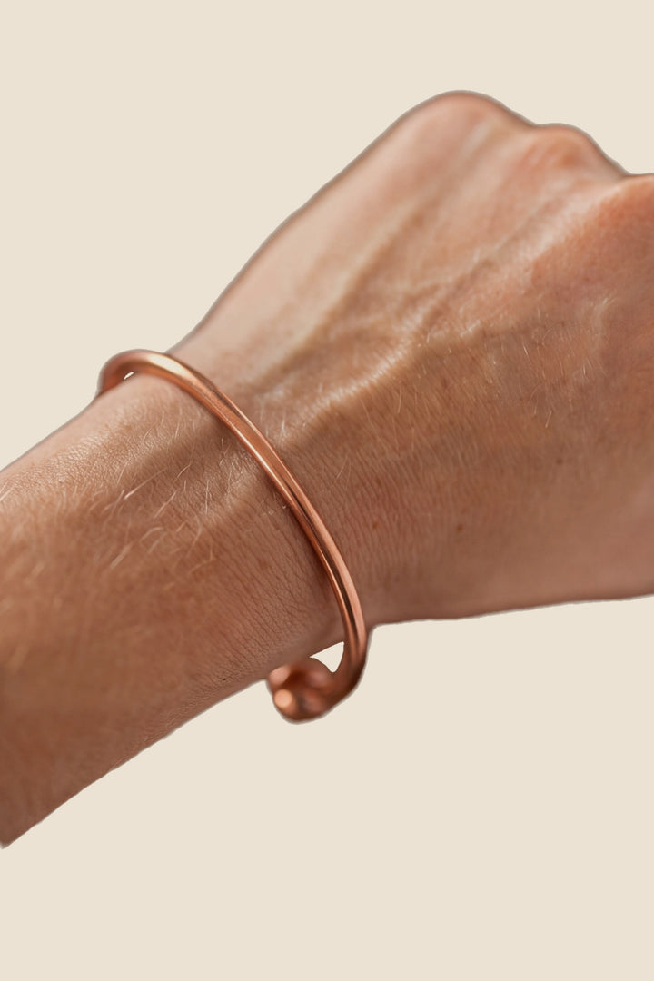 Kopero Kobberarmbånd Rund, om håndleddet, produktfoto på hvid baggrund